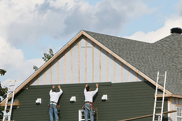 Professional Siding Contractor technician working in Sterling, IL